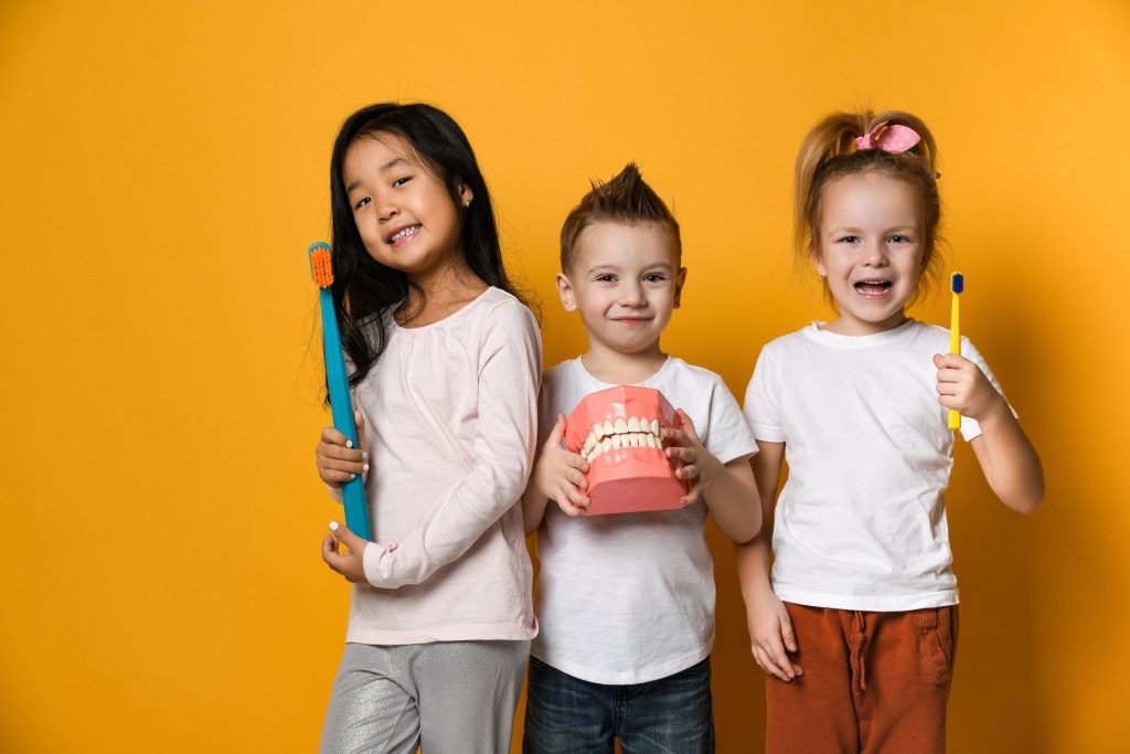 young kids visiting the dentist