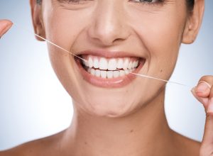 woman flossing